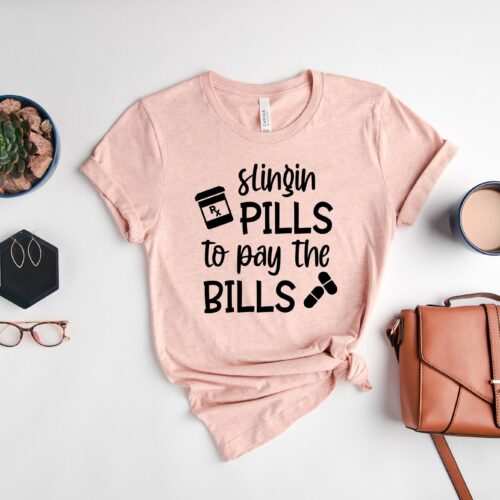 Slingin Pills To Pay The Bills Funny Nurse Pharmacist School Week Sarcastic Shirt image 0