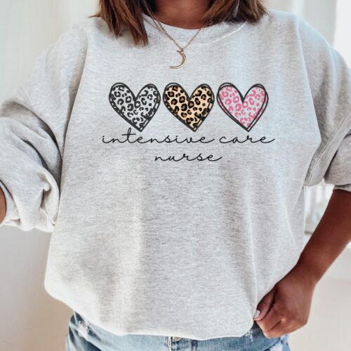 ICU Nurse Intensive Care Unit Hearts Leopard Sweatshirt image 0