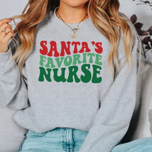 Santa's Favorite Nurse Christmas Holiday Cute Sweatshirt image 0