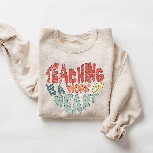 Retro Teaching Is A Work Of Heart Cute Team Funny Happy Sweatshirt image 0