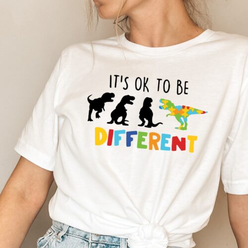 It's Ok To Be Different Autism Awareness Support Dinosaur Month Teacher Shirt image 0