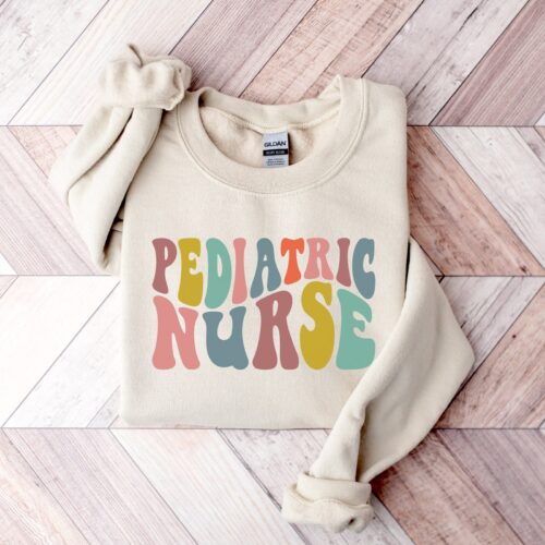 Pediatric Nurse PEDS RN Grad Rainbow Cute Sweatshirt image 0