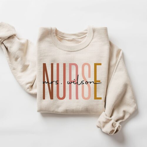 Personalize Nurse Last Name Cute Practitioner Emergency Sweatshirt image 0