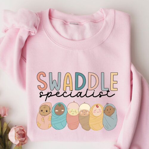 Swaddle Specialist Labor And Delivery NICU Neonatal Registered Nurse Sweatshirt image 0