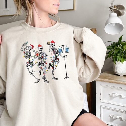 Christmas Skeleton Dancing Nurse Funny Cute Sweatshirt image 0