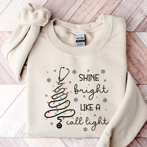 Christmas Shine Bright Like A Call Light Nurse Cute Sweatshirt image 0