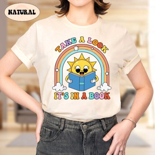 Teacher Take A Look It's In A Book Shirt Rainbow Elementary Kindergarten Graduation Shirt image 0