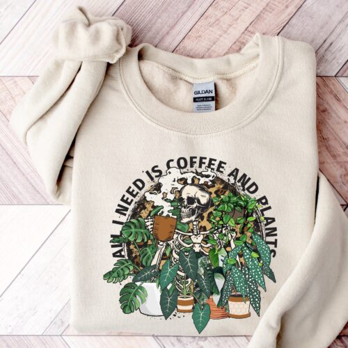 Skeleton Lover All I Need Is Coffee And Plants Halloween Leopard Lady Mom Sweatshirt image 0